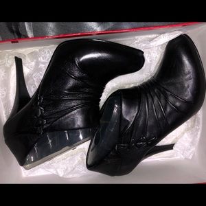 Brand new Guess bootie heels! Size 8.5!